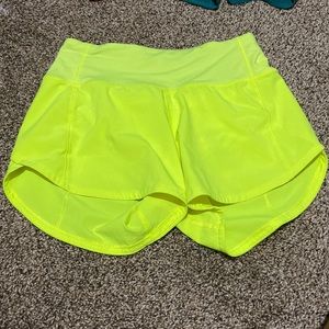 •Highlight Yellow Lululemon Mid Rise Speed Up Shorts 4 Inches Size 0